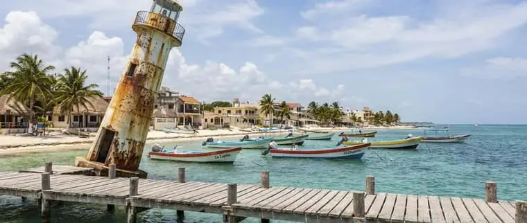 Puerto Morelos leaning lighthouse and fishing boats